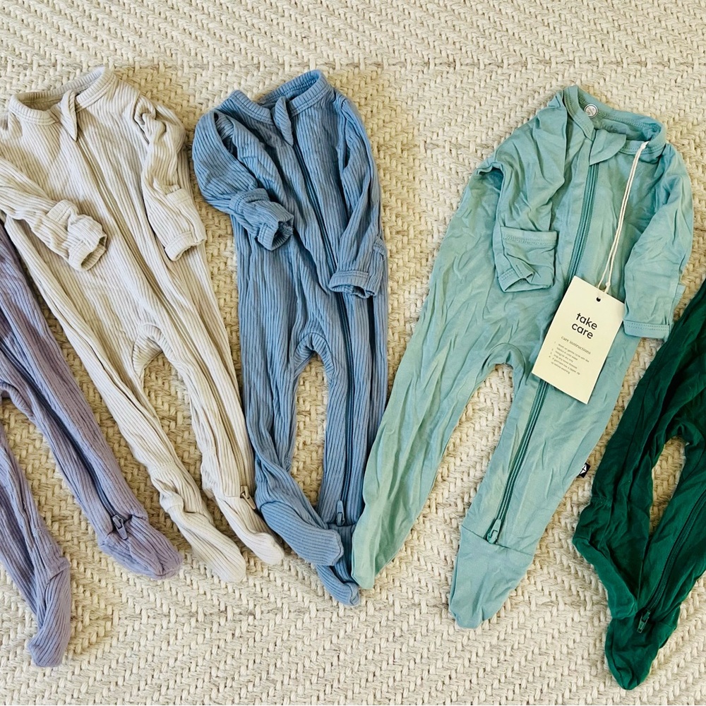 Set of five size newborn kyte baby bamboo zip up footie pajamas